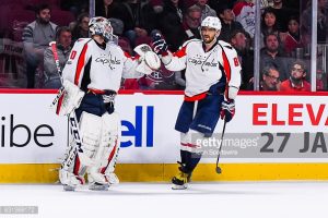 MONTREAL, QC - JANUARY 09: Washington Capitals Left Wing Alex Ovechkin (8) meeting Washington Capitals Goalie Braden Holtby (70) to celebrate his goal, the fourth of the game making the score 4-1 Capitals during the Washington Capitals versus the Montreal Canadiens game on January 9, 2017, at Bell Centre in Montreal, QC (Photo by David Kirouac/Icon Sportswire)